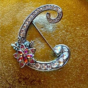 Beautiful gently used (displayed) sparkly C brooche